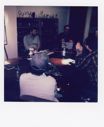 Photo of an early Higher Booking meeting